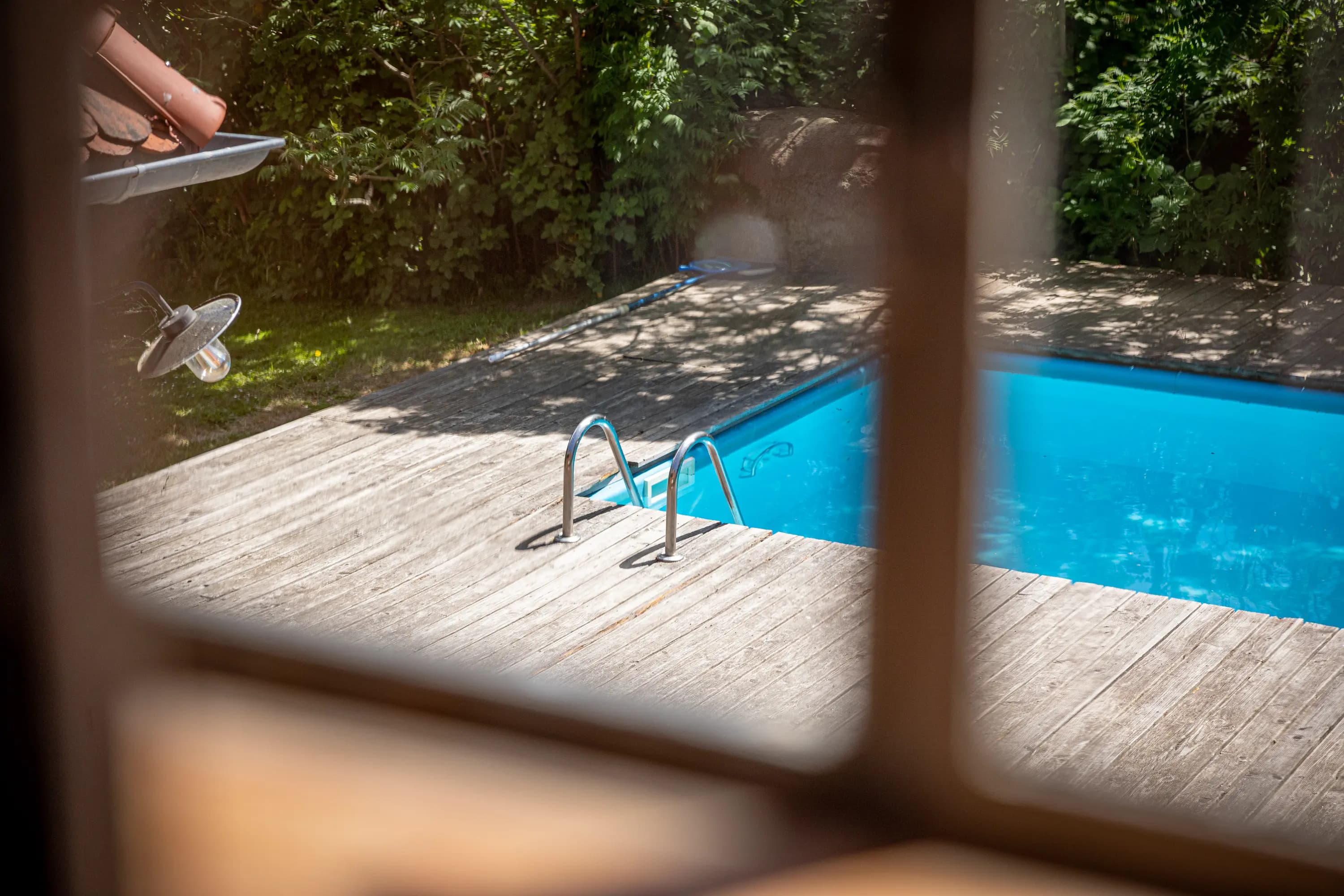 Schlafzimmeransicht mit Sitzgelegenheit und schöner Aussicht im Feriengut Welzin